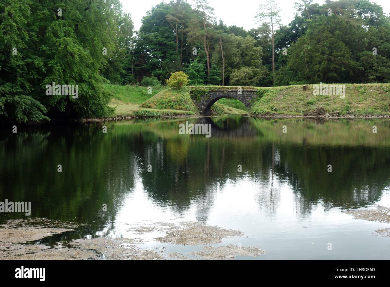 Encombe Bridge, Dam & Embankment over the Outflow from Ingleborough Lake from Clapdale Drive near Clapham, Yorkshire Dales National Park, England, UK. Stock Photo