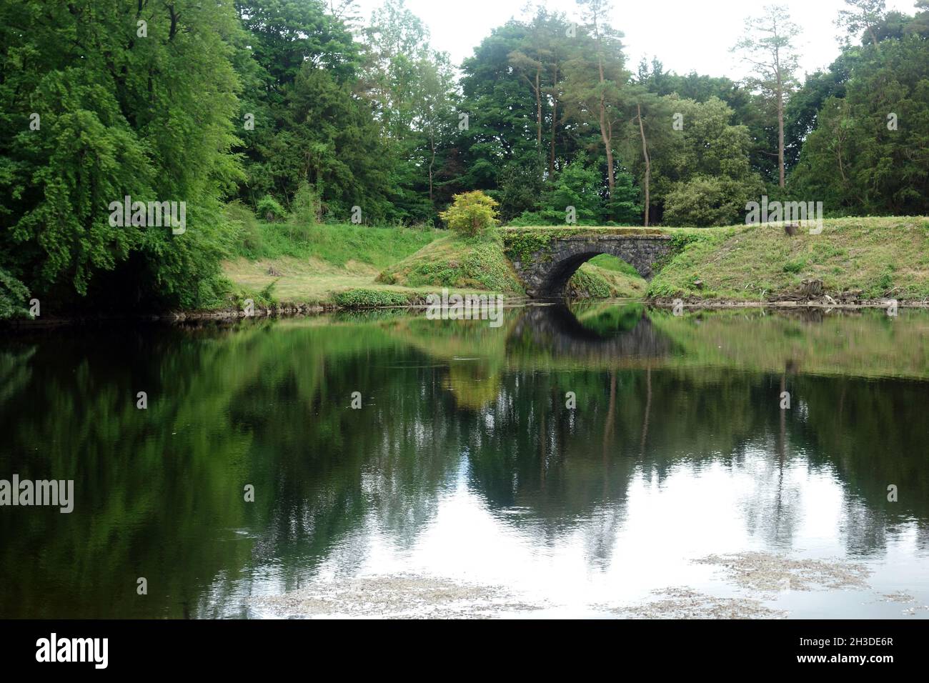 Encombe Bridge, Dam & Embankment over the Outflow from Ingleborough Lake from Clapdale Drive near Clapham, Yorkshire Dales National Park, England, UK. Stock Photo