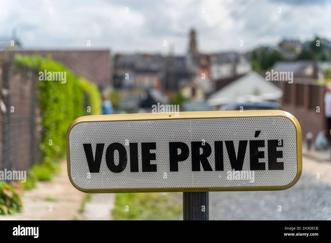 Signboard in Honfleur with the french sign Voie privee - private road in english translation Stock Photo