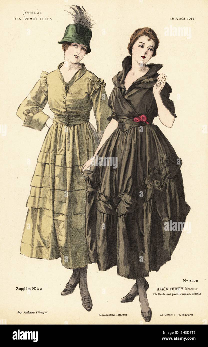 Two fashionable women on a summer stroll, WWI.. One in green cloche hat with plume, moire dress, the other with ruched dress in pewter moire. Handcoloured lithograph by Fattorini & Crespin from Alain Thiery’s fashion magazine Journal des Demoiselles, 79 Boulevard Saint-Germain, Paris, France, August 15, 1916. Stock Photo