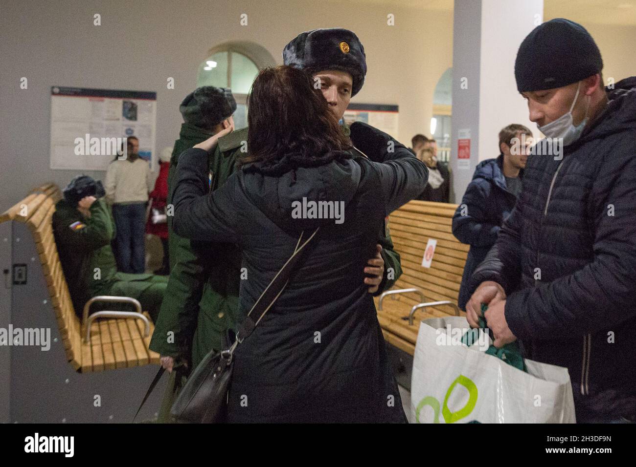St. Petersburg, Russia. 27th Oct, 2021. A new army conscript says goodbye before he sets off with a train to the military site in St. Petersburg, Russia, Oct. 27, 2021. Russia's autumn army recruitment started on Oct. 1. Credit: Irina Motina/Xinhua/Alamy Live News Stock Photo