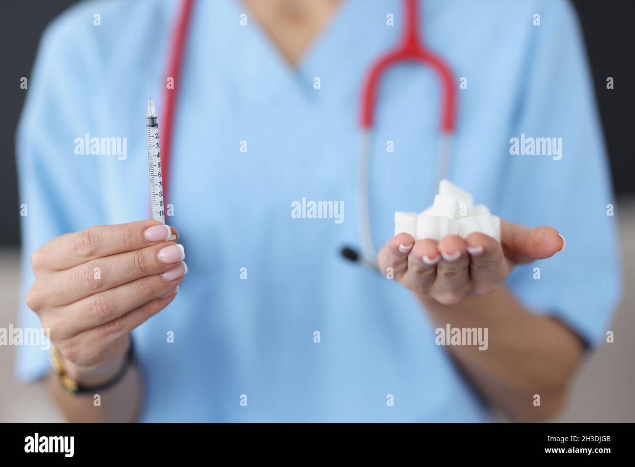 Insulin syringe and refined sugar Stock Photo Alamy