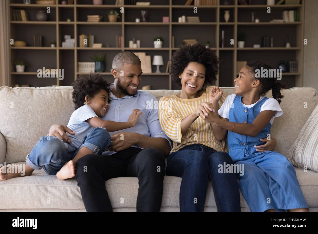 Happy african american couple having fun together at home Stock Photo ...