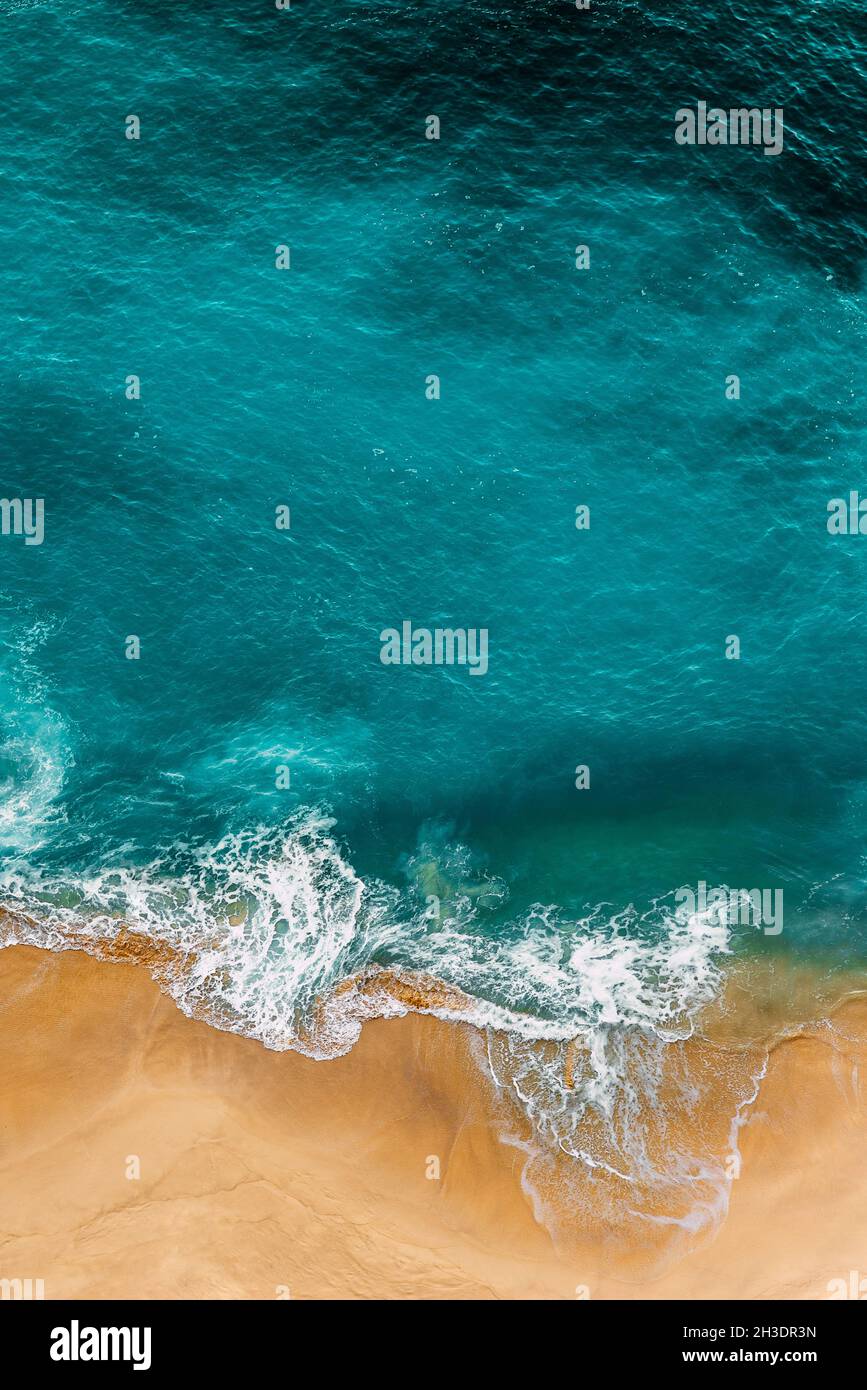 Clean sea and clean beach. Clean beach with yellow sand. Seascape aerial photography. Sea coast, view from the height. Beautiful sandy beach Stock Photo