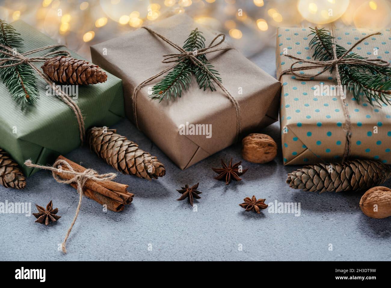 Christmas zero waste packaging gift boxes wrapped in kraft paper with ...