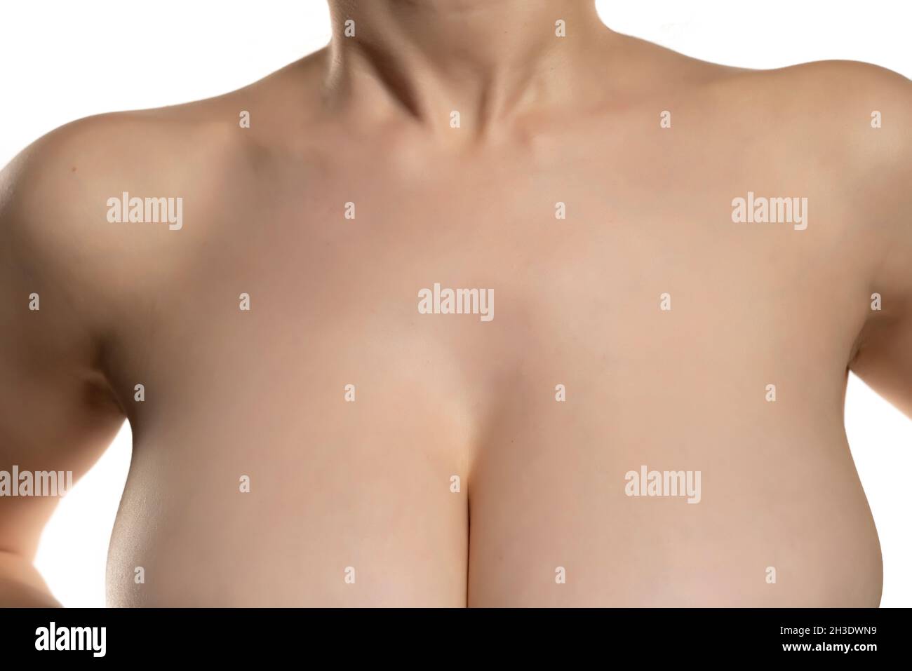 Cleavage Of A Woman With Large Breasts On A White Background Stock cleavage-of-a-woman-with-large-breasts-on-a-white-background-stock