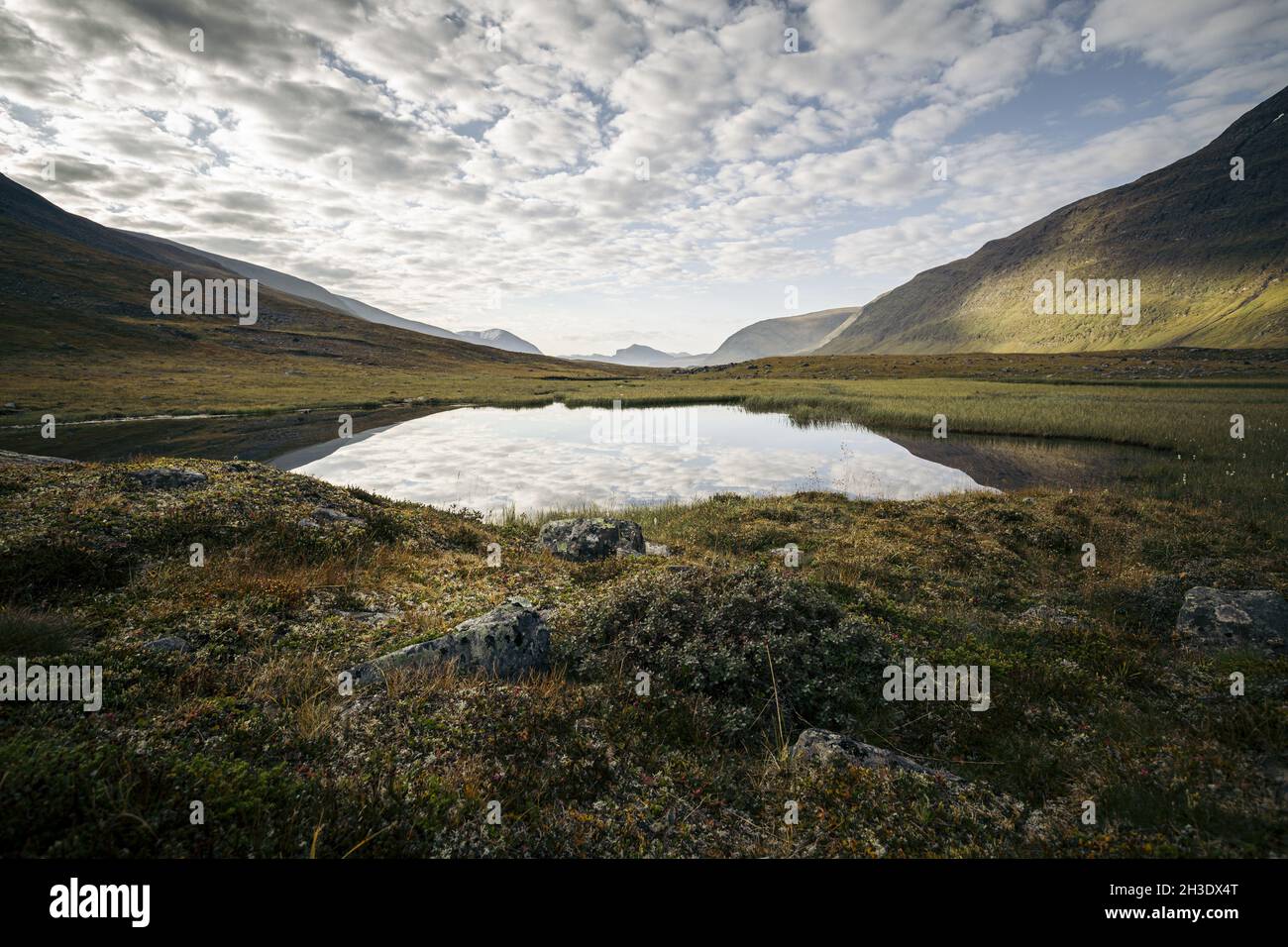 NIKKALUOKTA, SWEDEN - Sep 06, 2021: A view of  The Kungsleden Trail and its beautiful Mountain Lake in Nikkaluokta, Sweden Stock Photo