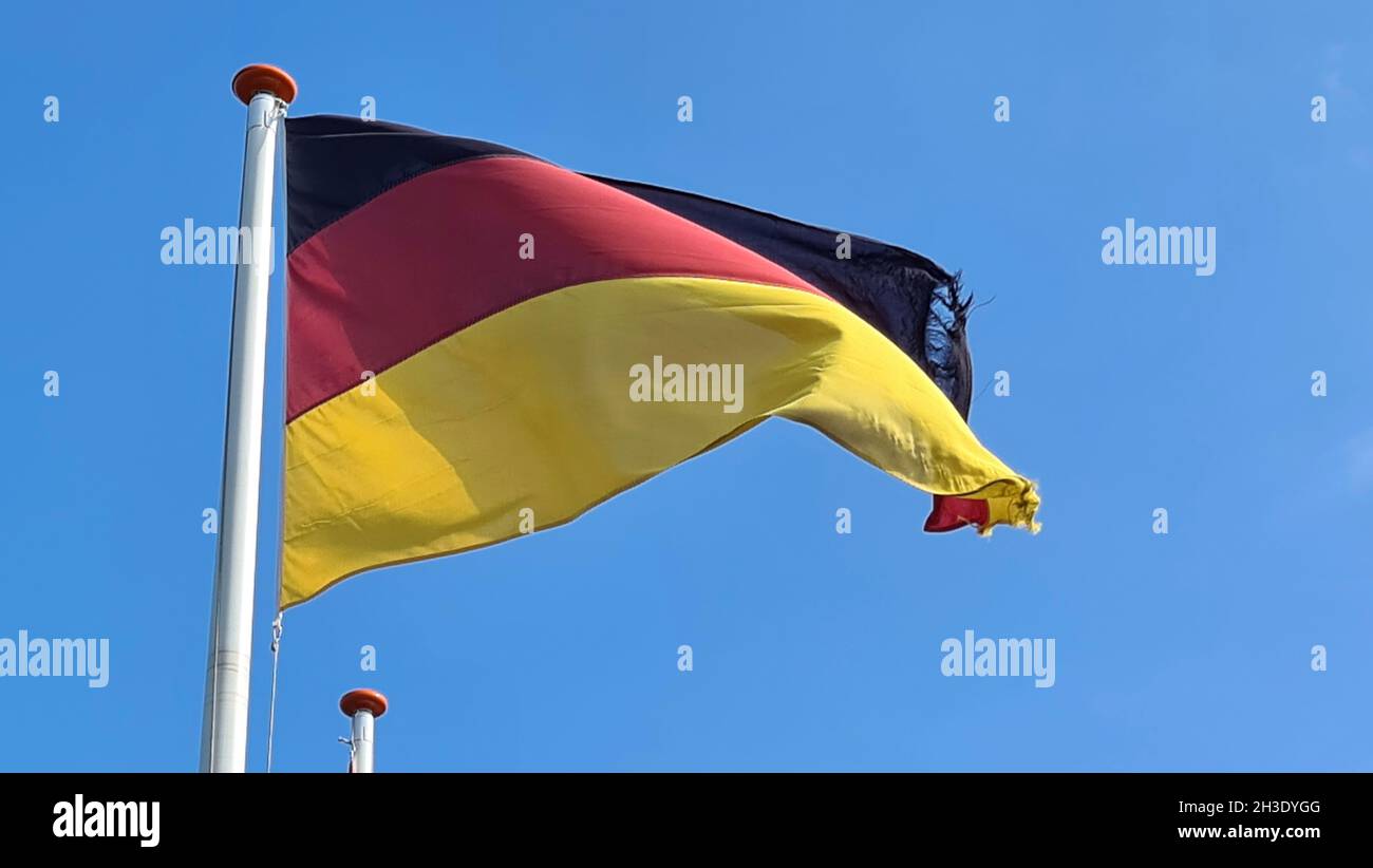 frayed German flag in wind, Germany, 4 Stock Photo