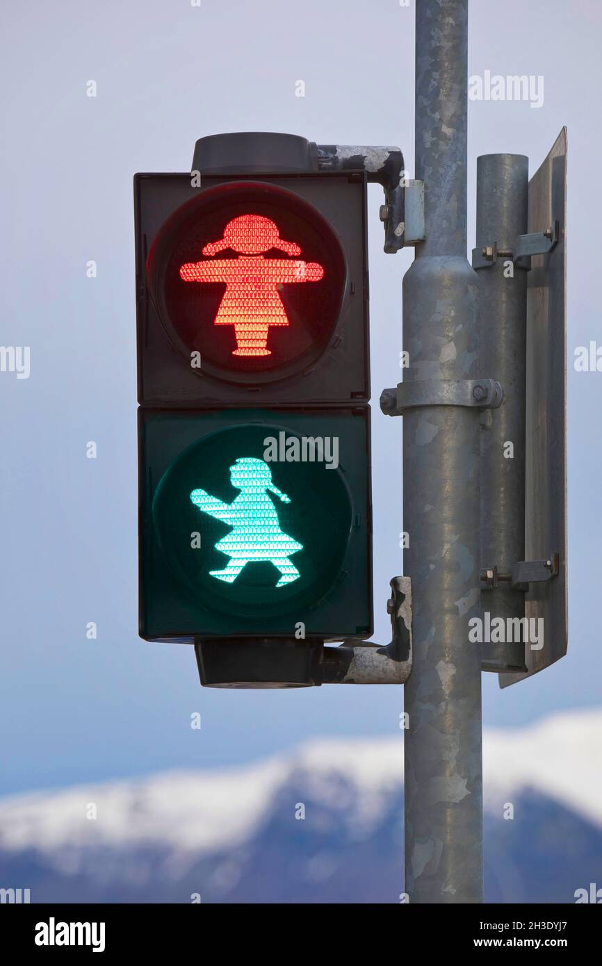 Pedestrian traffic light with red and green traffic light woman, Iceland, Reykjavik Stock Photo