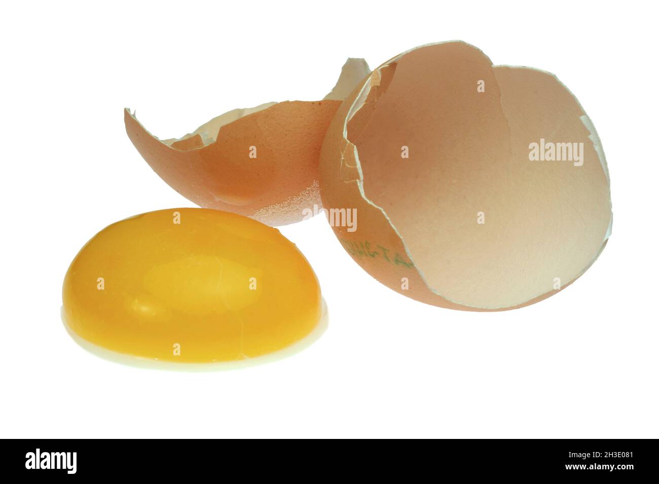 egg yolk and empty egg shell, cutout Stock Photo Alamy