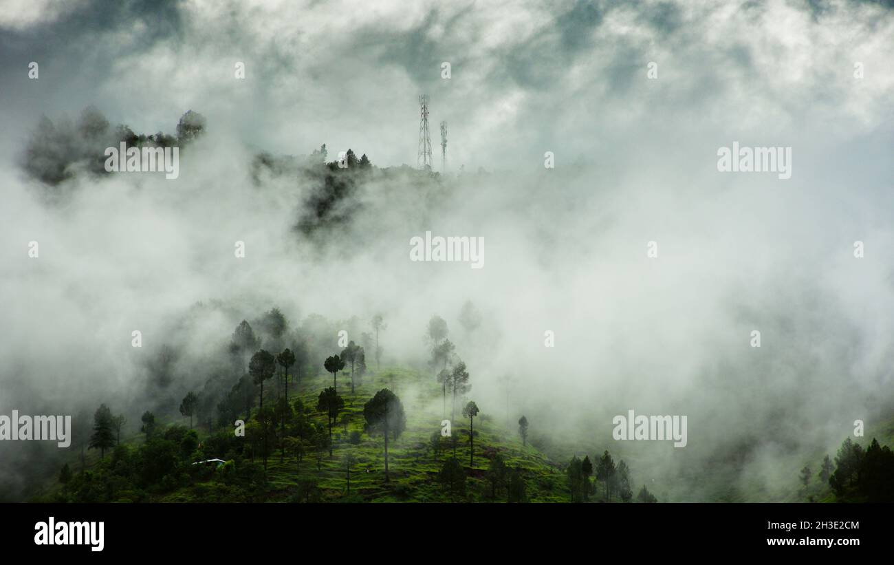 Mountains covered by fog hi-res stock photography and images - Alamy