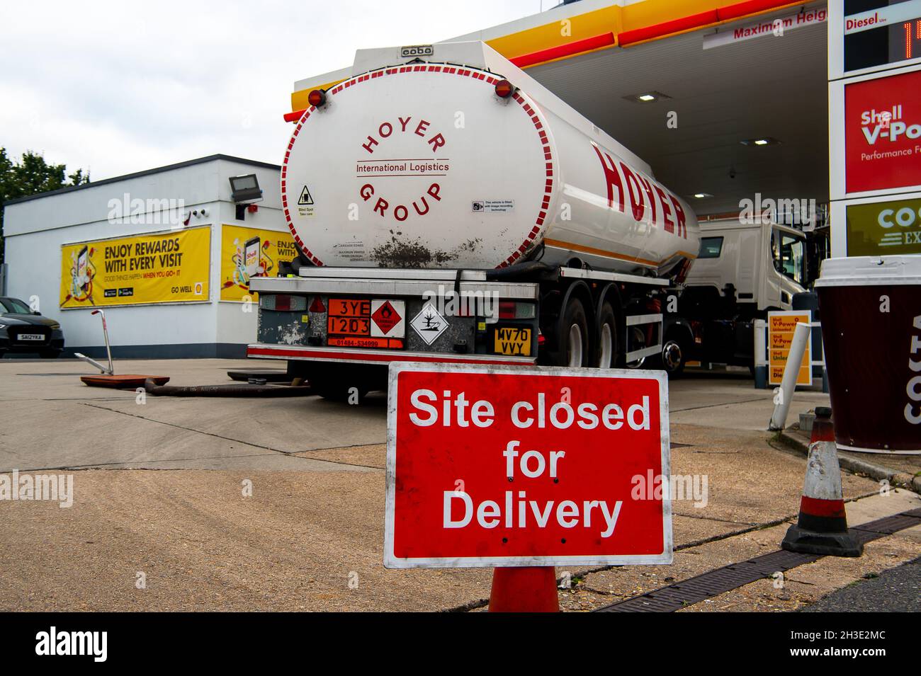 Slough, Berkshire, UK. 28th October, 2021. A tanker delivery to the Shell petrol station on Burnham Lane on the outskirts of Slough Trading Estate. Petrol prices continue to rise on a regular basis. Credit: Maureen McLean/Alamy Live News Stock Photo