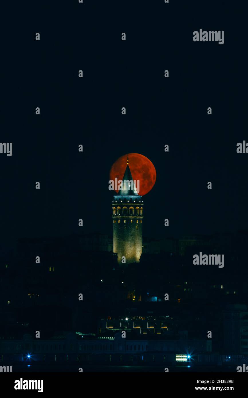 Galata Tower at moonset in Istanbul. Istanbul story background photo ...