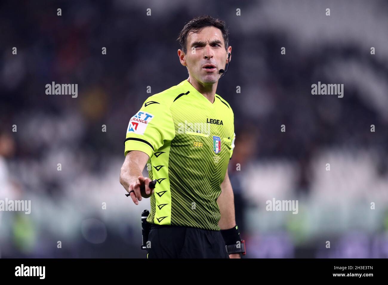 The referee looks on hi-res stock photography and images - Alamy