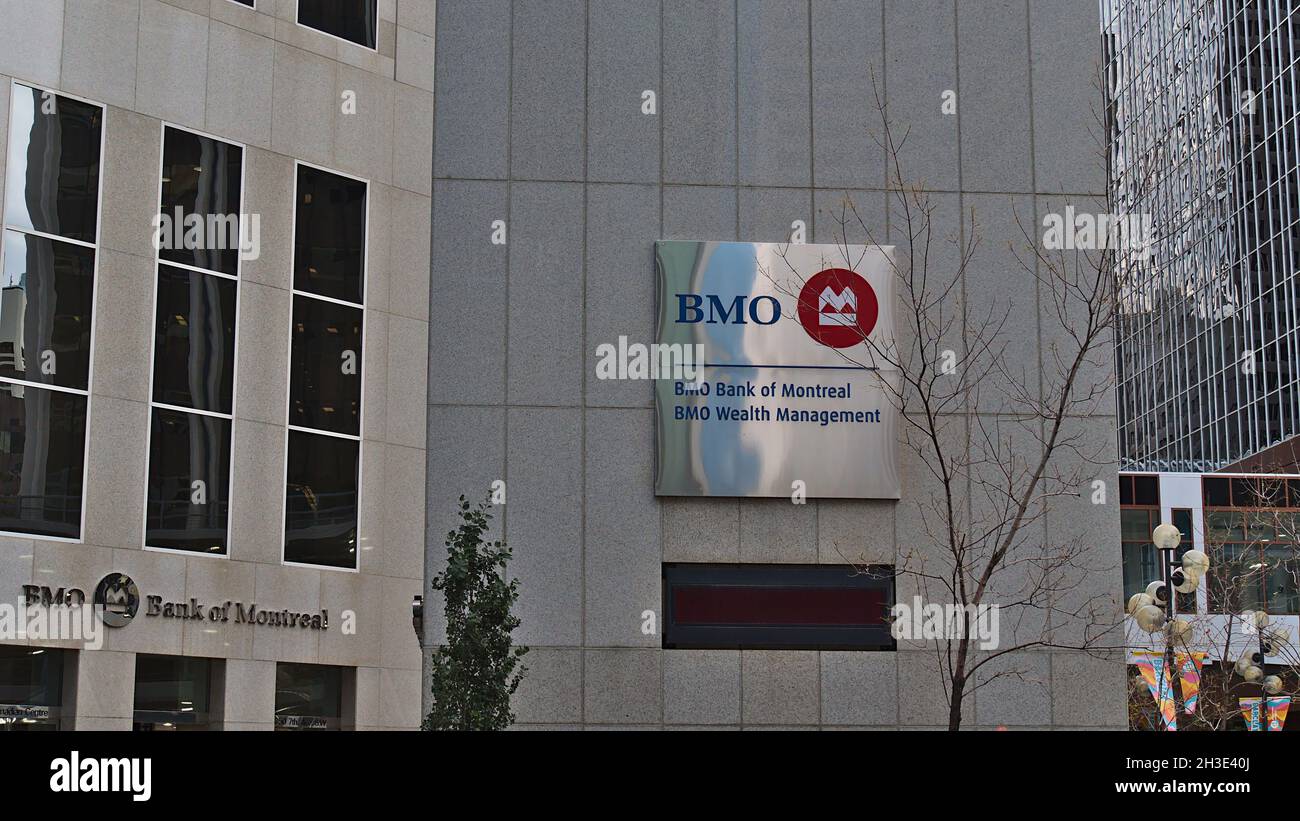 View of office building facade in Calgary downtown with logo of Bank of Montreal (BMO). Stock Photo