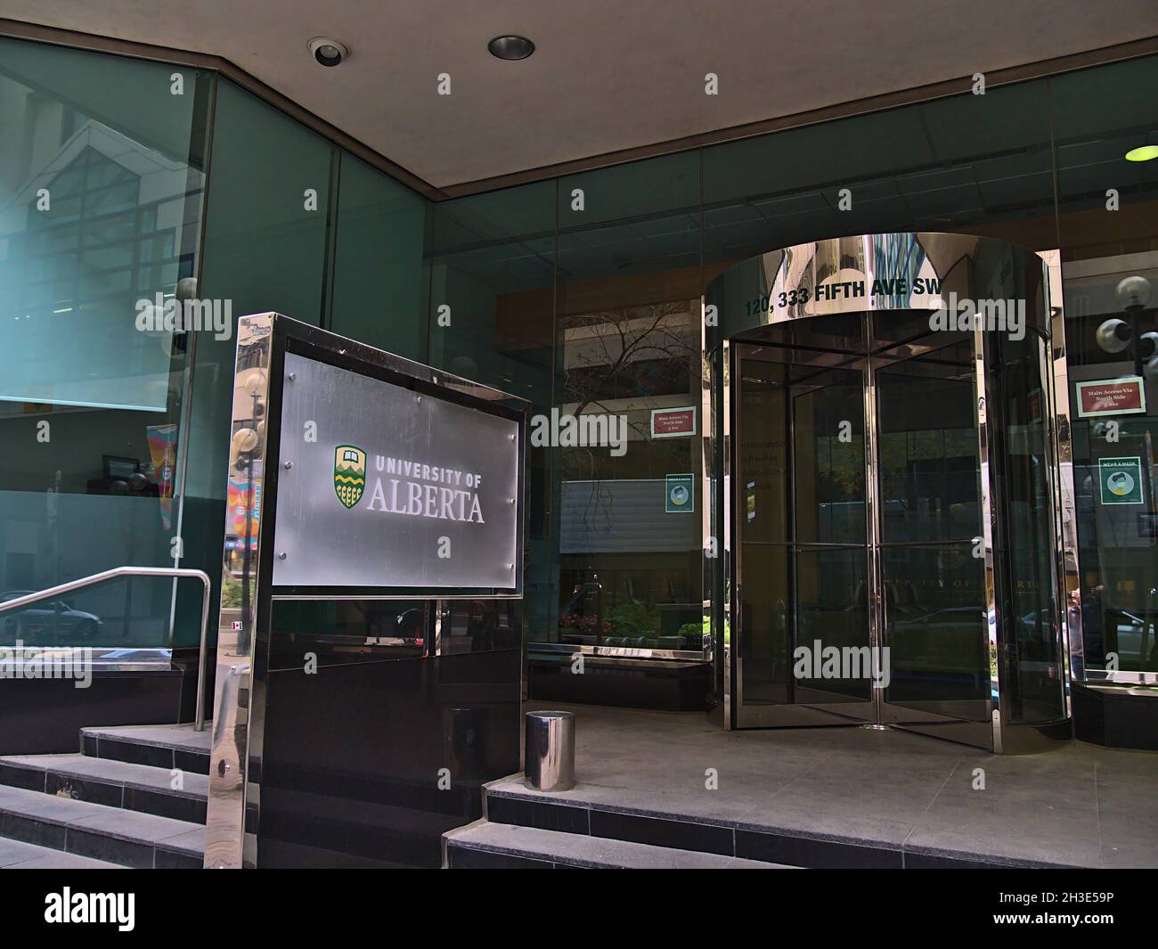 Entrance of University of Alberta Calgary Centre in downtown with logo