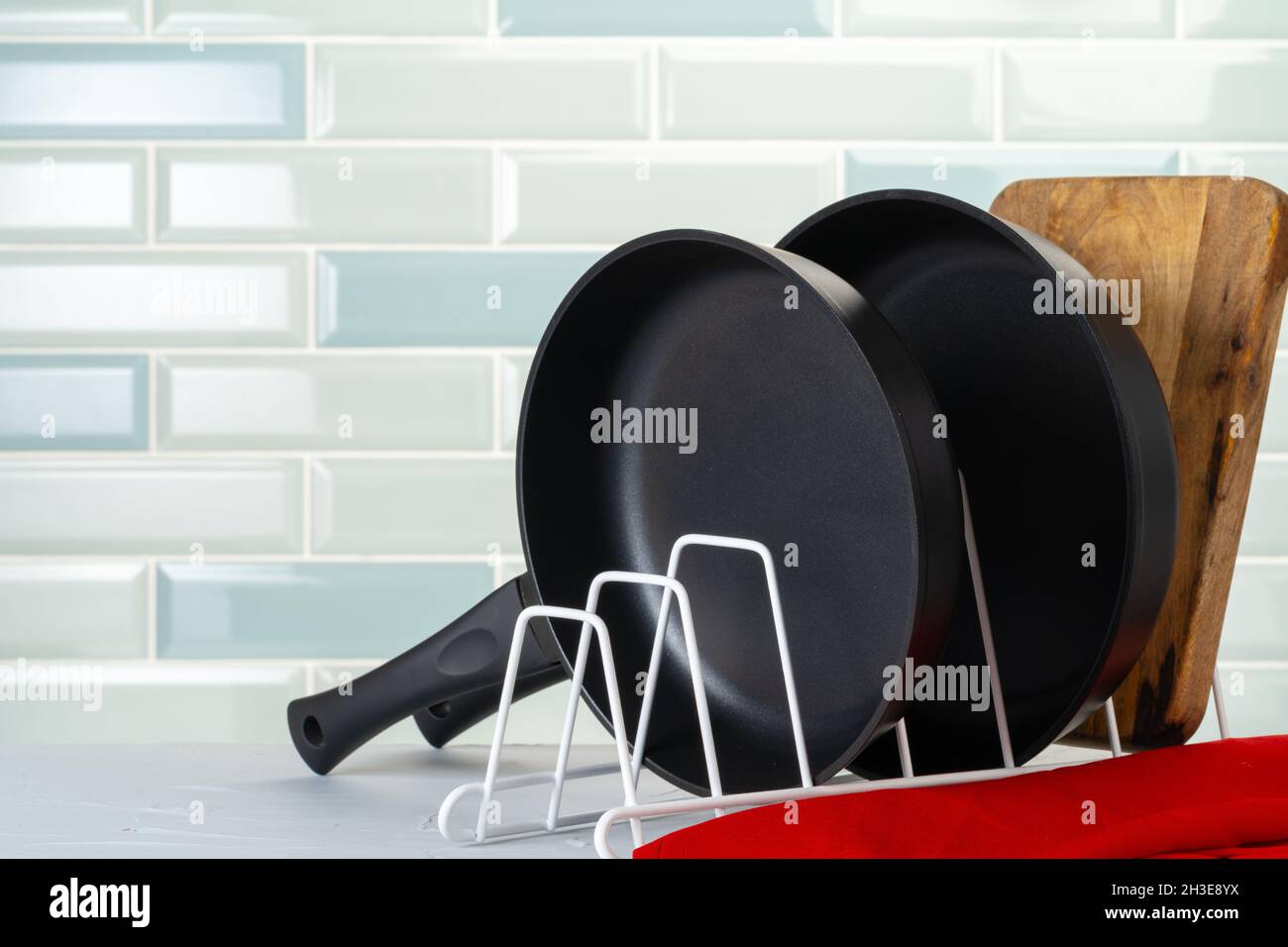 Clean and dry cooking pans on a kitchen counter Stock Photo Alamy