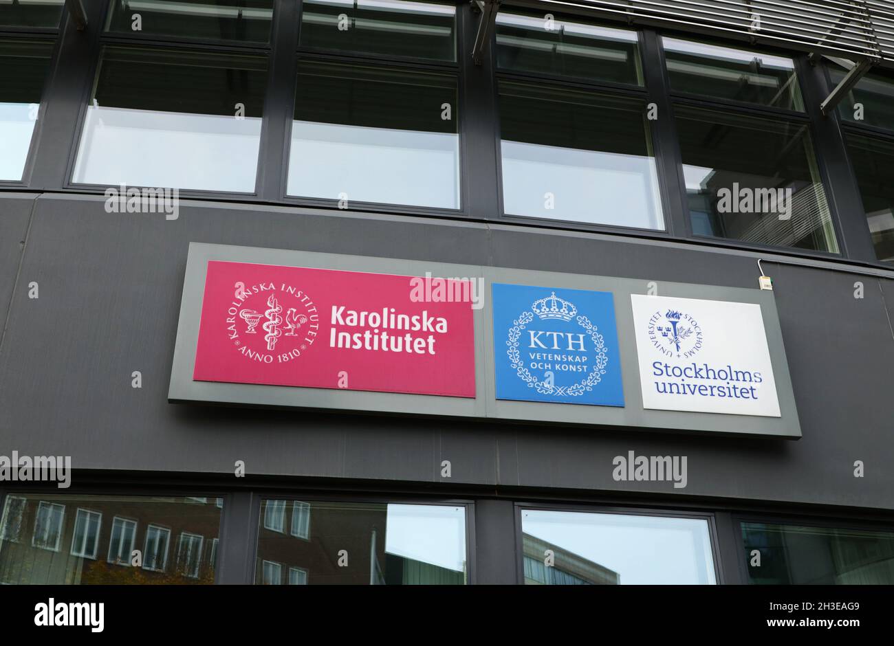 Signs at Campus Solna in Solna, Stockholm, Sweden. From left: The Karolinska Institute (karolinska Institutet), KTH Vetenskap och konst and Stockholm University (Stockholms universitet). Stock Photo