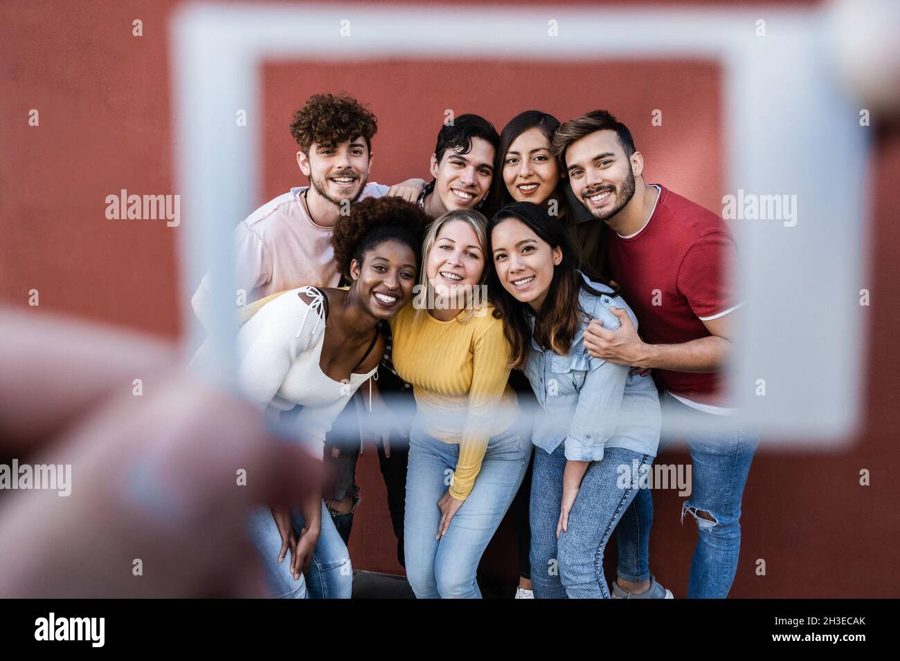 Happy multiracial friends having fun outdoor - Focus on african girl ...