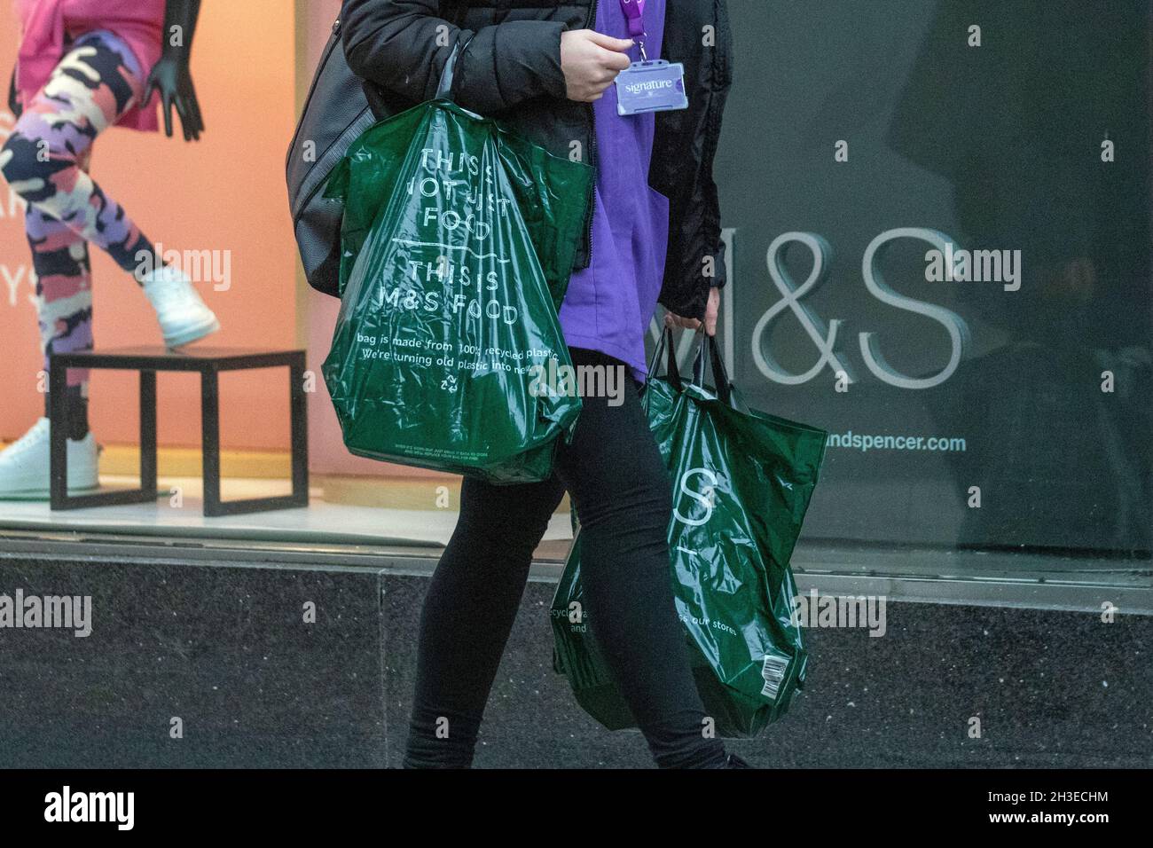 Green Marks and Spencer plastic bags; Shops, shoppers & shopping in