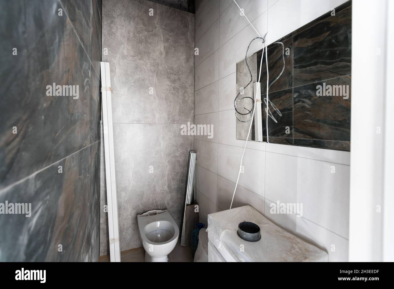 bathroom renovation removing tiles in apartment bathroom Stock Photo Alamy