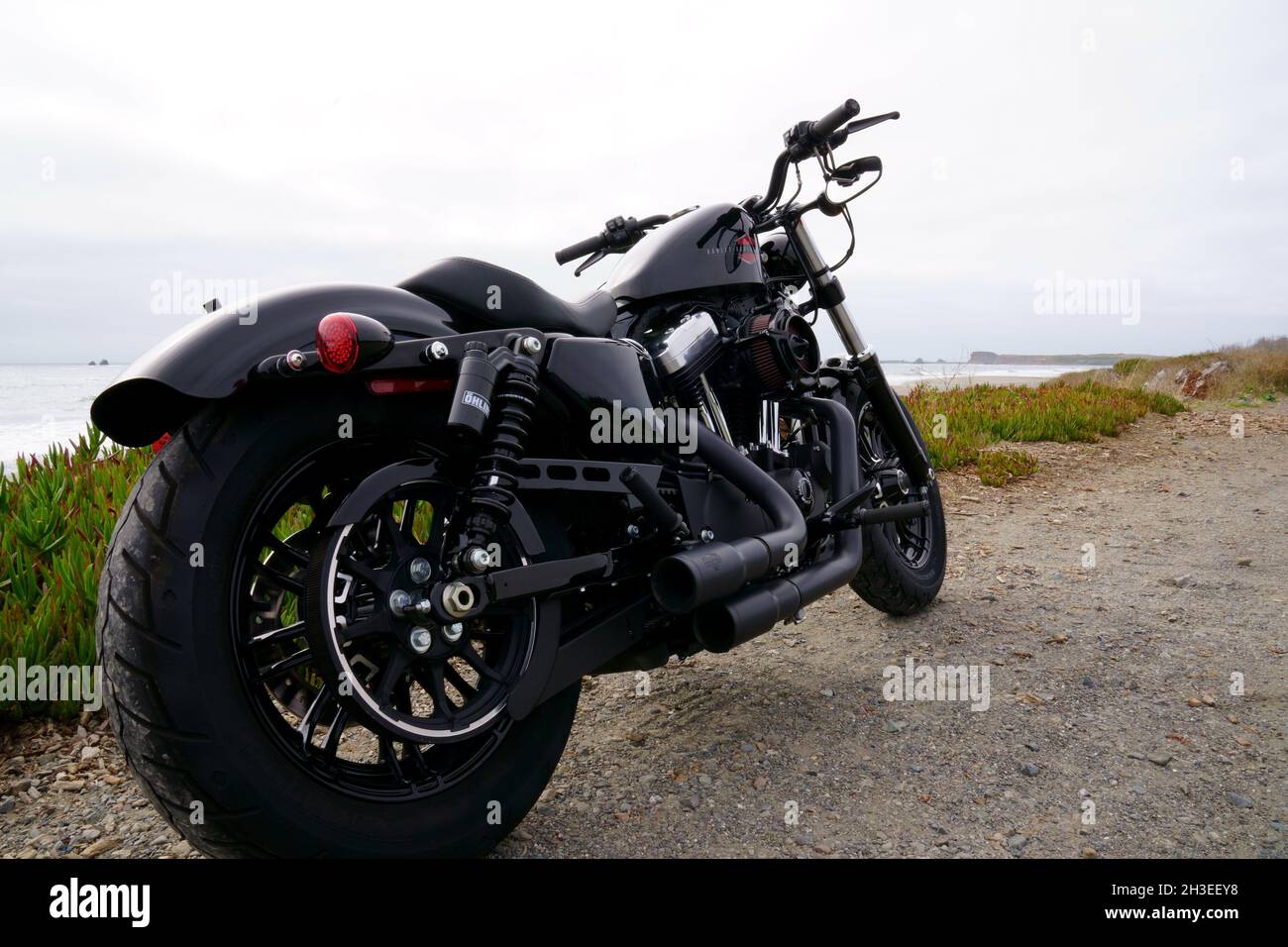 CRESCENT CITY, UNITED STATES - Sep 26, 2021: Harley Davidson Sportster Forty-Eight at the Pacific Ocean Stock Photo