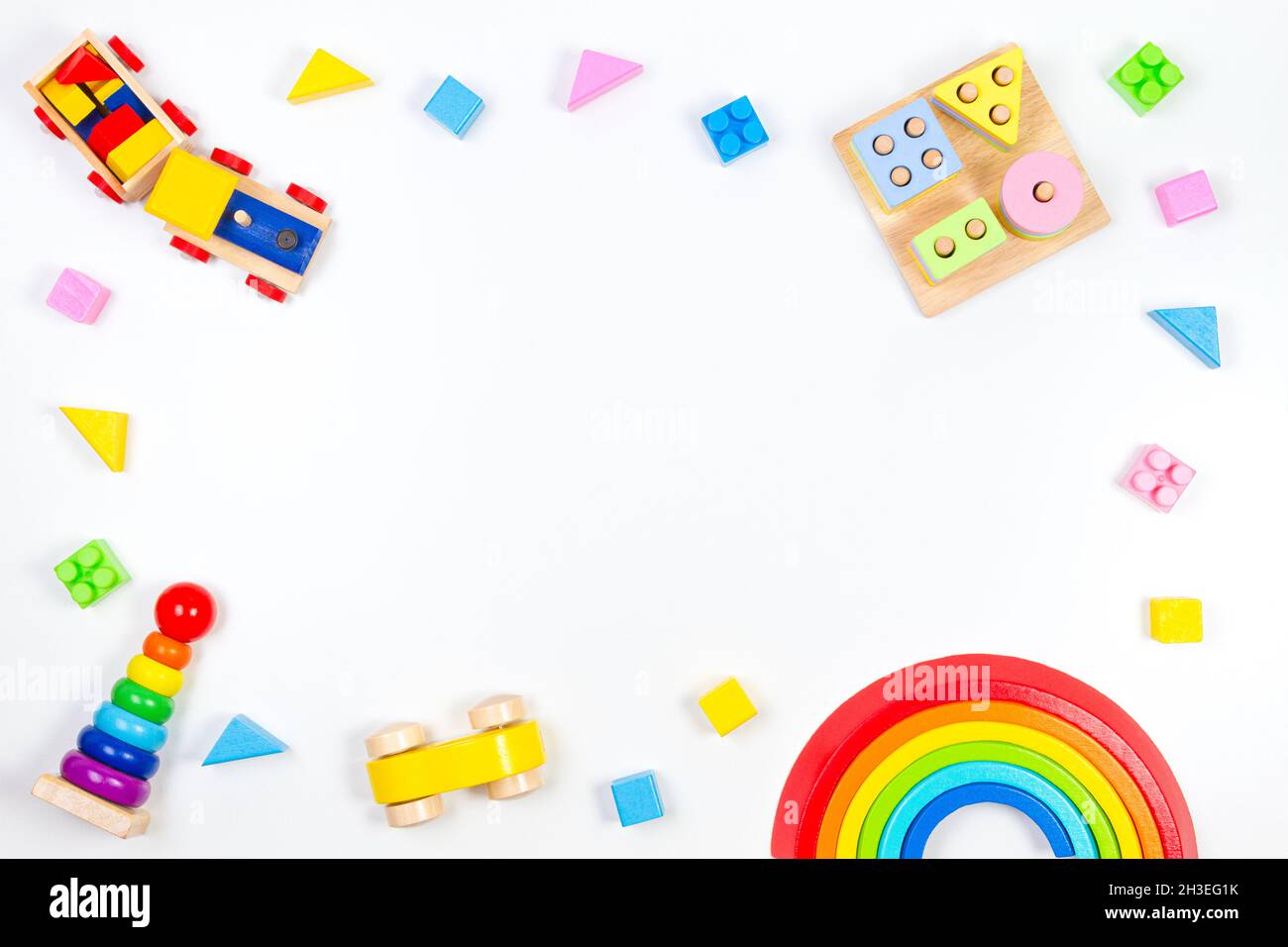 Baby kids toys background. Wooden educational geometric stacking blocks ...