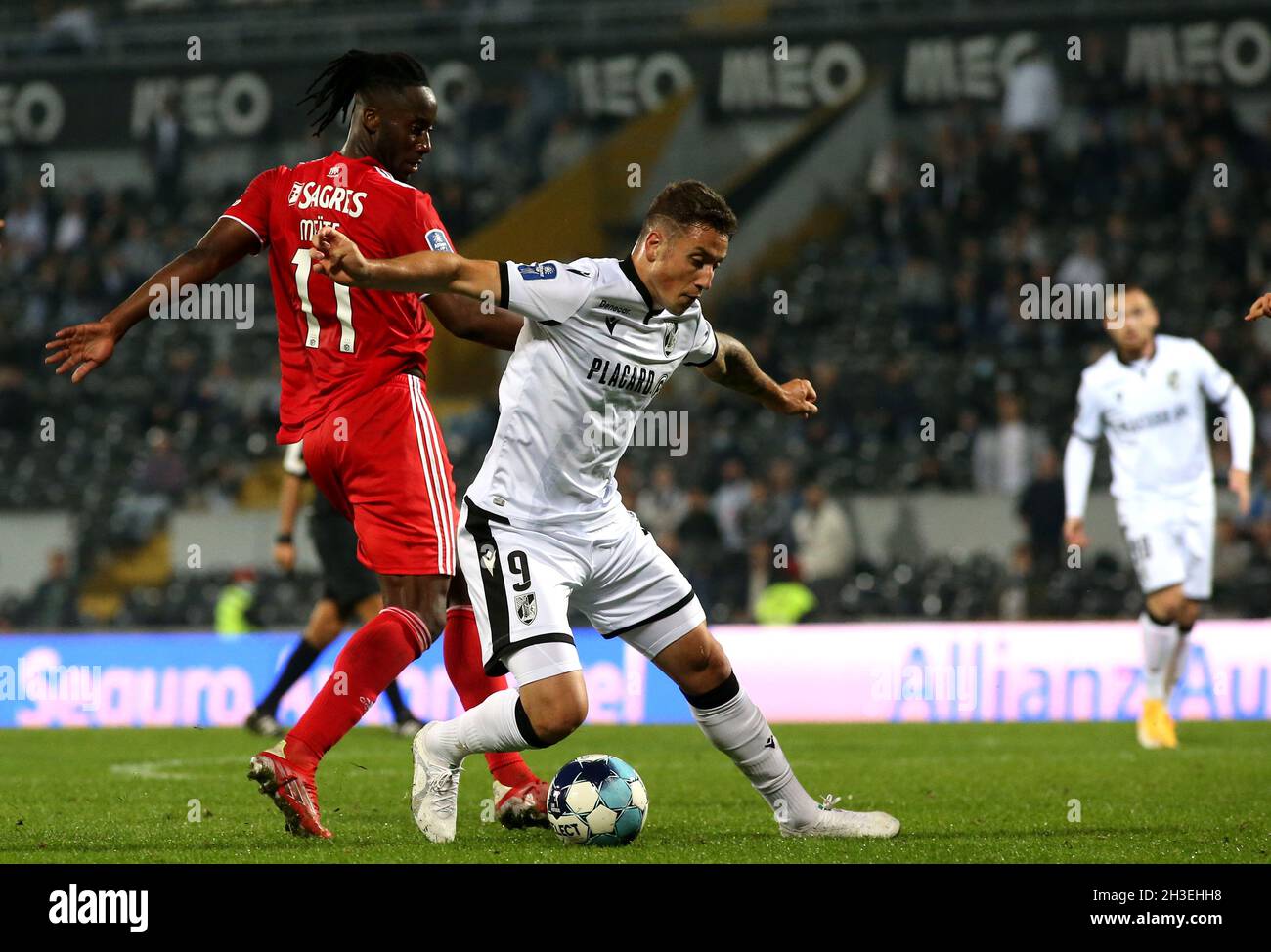 GUIMARAES, PORTUGAL - OCTOBER 27: Bruno Duarte of Vitoria Sc competes for the ball with Soualiho Meite of Benfica SL ,during the Portugal Allianz Cup match between Vitoria SC and Benfica SL at Estadio Dom Afonso Henriques on October 27, 2021 in Guimaraes, Portugal. (Photo by MB Media) Stock Photo