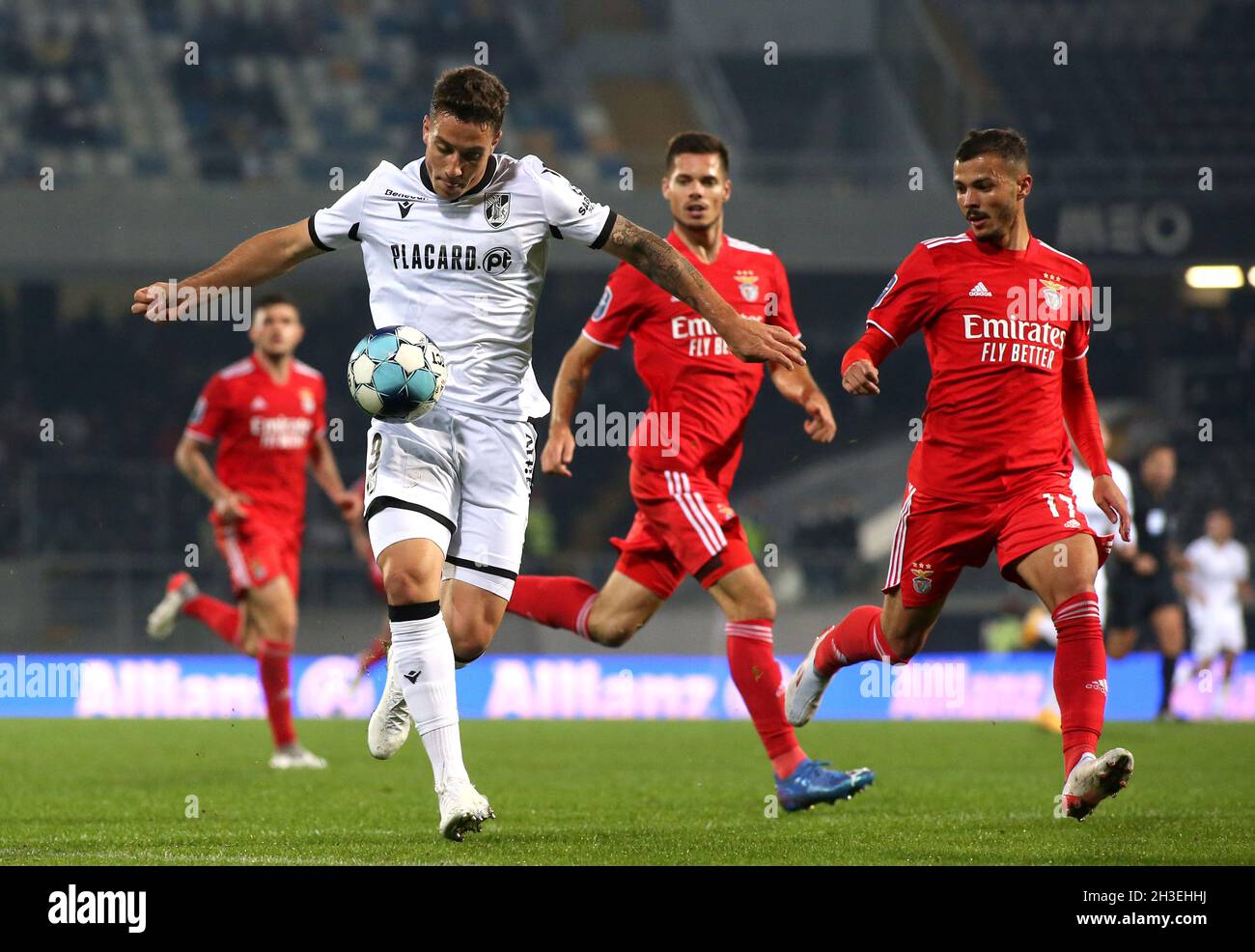 GUIMARAES, PORTUGAL - OCTOBER 27: Bruno Duarte of Vitoria Sc competes for the ball with Diogo Goncalves of Benfica SL ,during the Portugal Allianz Cup match between Vitoria SC and Benfica SL at Estadio Dom Afonso Henriques on October 27, 2021 in Guimaraes, Portugal. (Photo by MB Media) Stock Photo