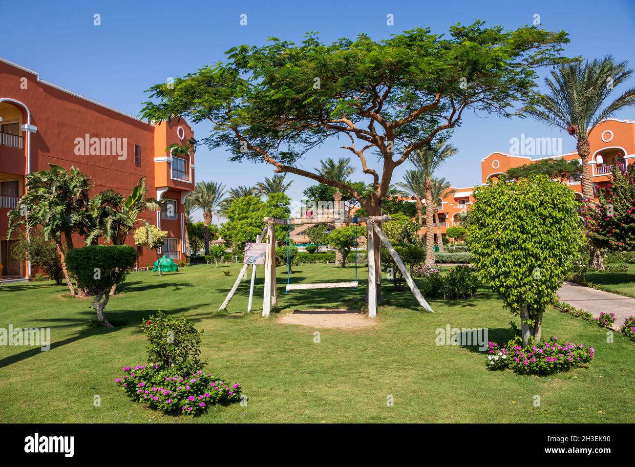 Hurghada, Egypt September 25 2021 Egyptian garden with wooden swing
