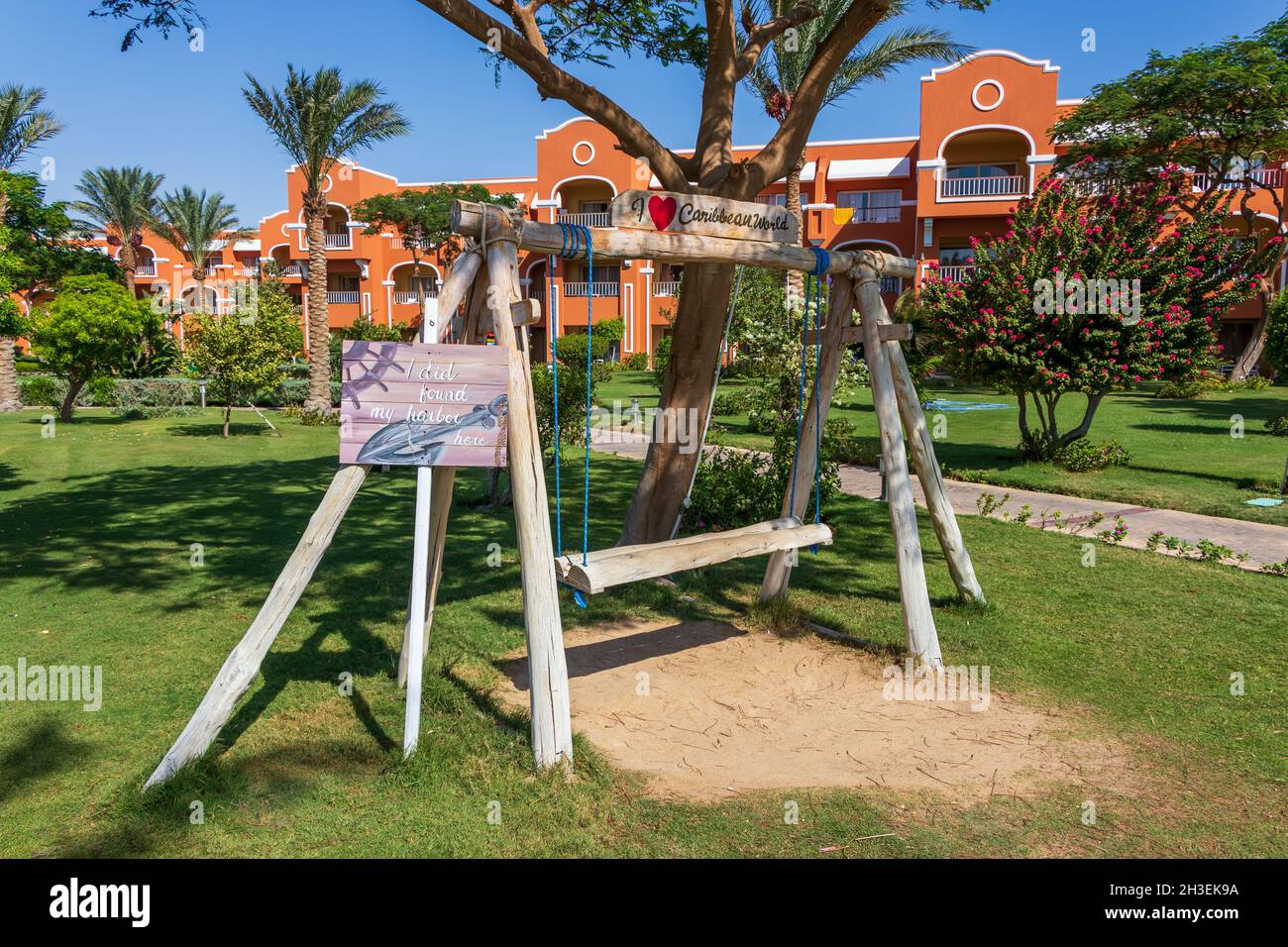 Hurghada, Egypt September 25 2021 Egyptian garden with wooden swing
