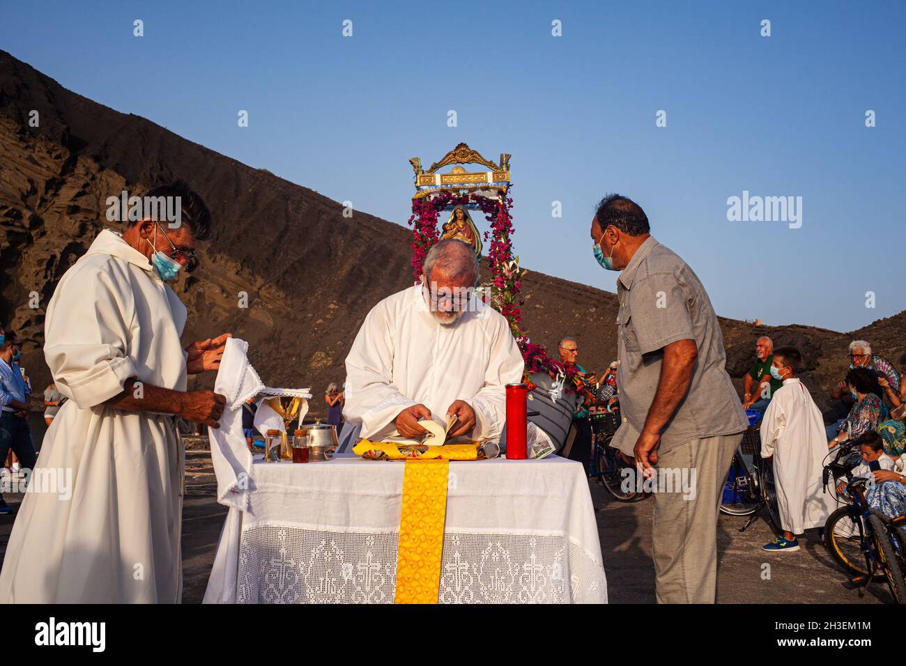 Linosa, Italy - July 25: Priest officiates the mass in the Procession of the Stella Maris during the religious patronal feast of the Madonna of the se Stock Photo