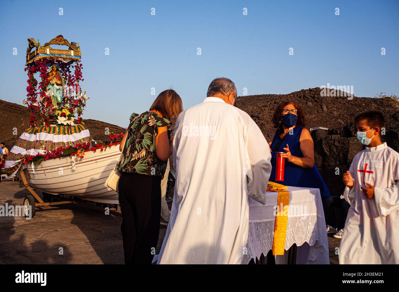 Linosa, Italy - July 25: Priest officiates the mass in the Procession of the Stella Maris during the religious patronal feast of the Madonna of the se Stock Photo