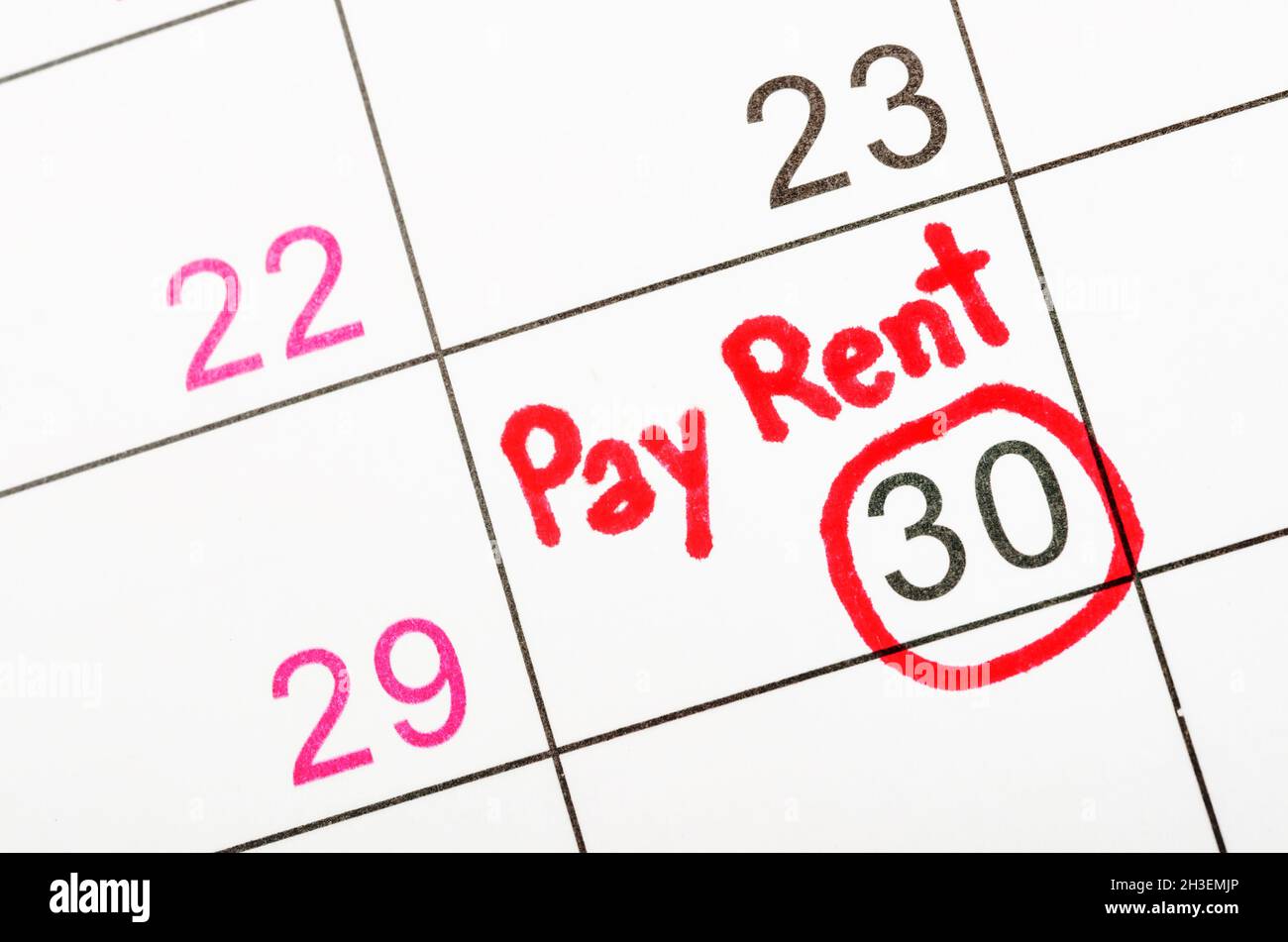 Pay rent is written on sheet of calendar Stock Photo Alamy
