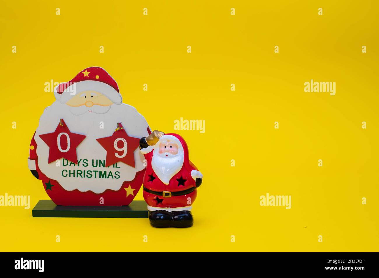 Christmas calendar counting down the days of a wooden Santa Claus Stock