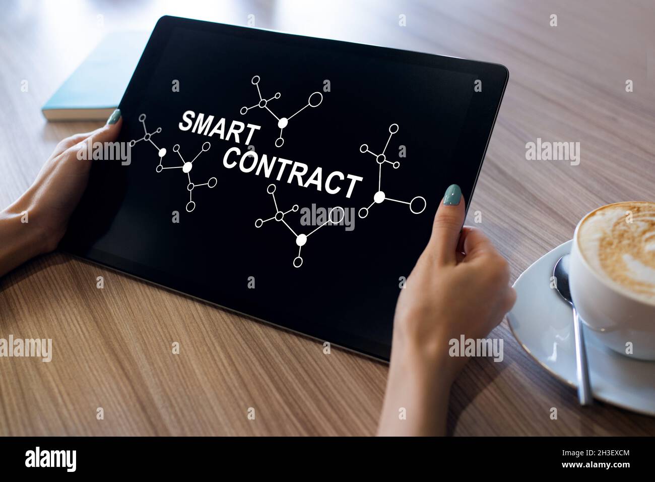 Smart contract blockchain based technology concept on screen. Cryptocurrency, Bitcoin and ethereum. Stock Photo