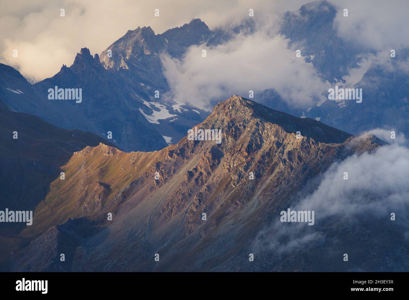 Gignod, Aosta Valley (Italy): Stau effect on Crou de Bleintse's  slopes. Stock Photo