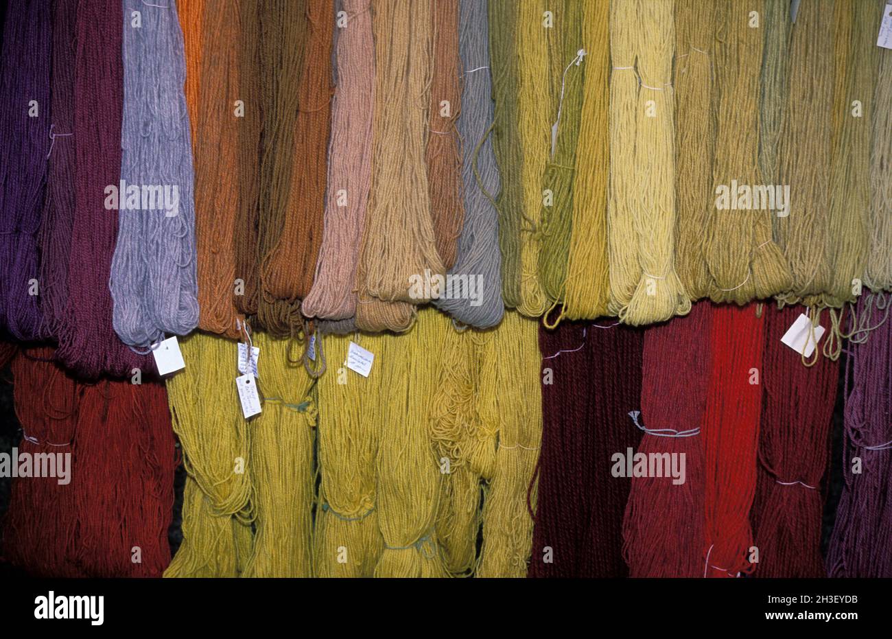 Yarn for sale in 1990, analog. Colorful yarn on sticks for sale at a market in 1990 in Bjursås, Sweden. Stock Photo