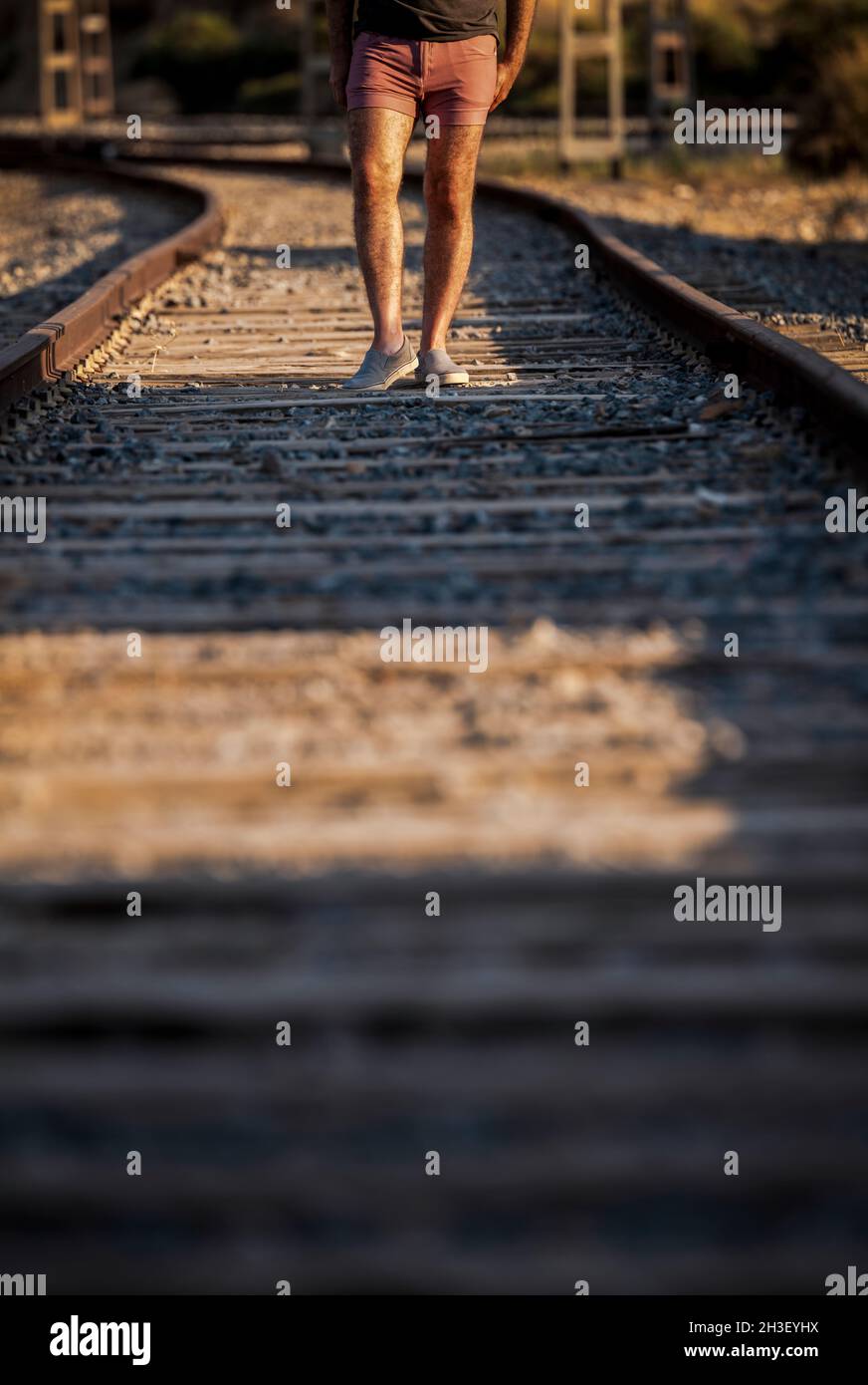 Man walking on rail track hi-res stock photography and images - Alamy