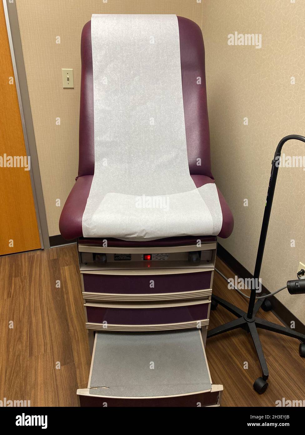 Exam table at the doctors office Stock Photo Alamy