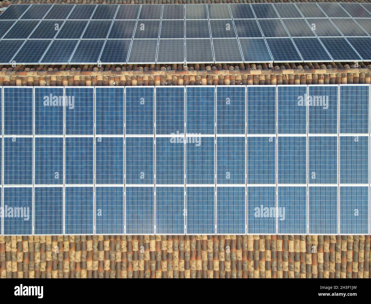 Solar panels for renewable energy on the roof of a house Stock Photo ...