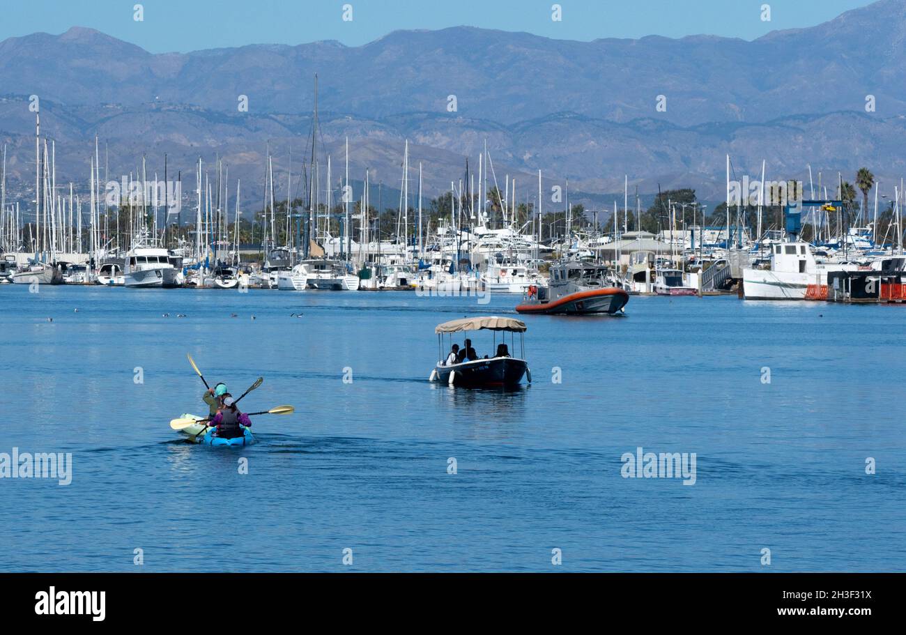 Kayakers and other boats in the Channel Islands Harbor in Oxnard, California USA Stock Photo
