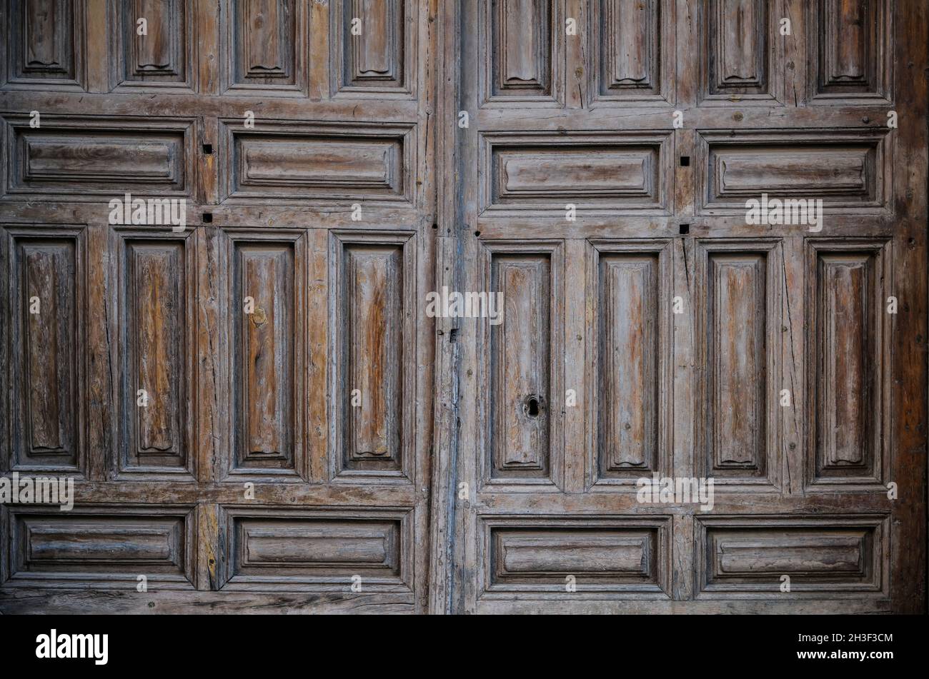 Closeup of wooden brown door in Ayllon, Spain Stock Photo