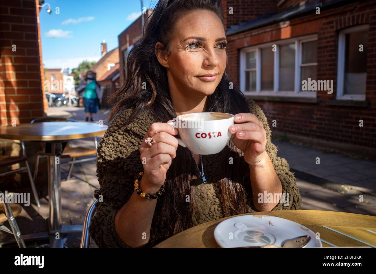 Woman at Costa coffee Stock Photo