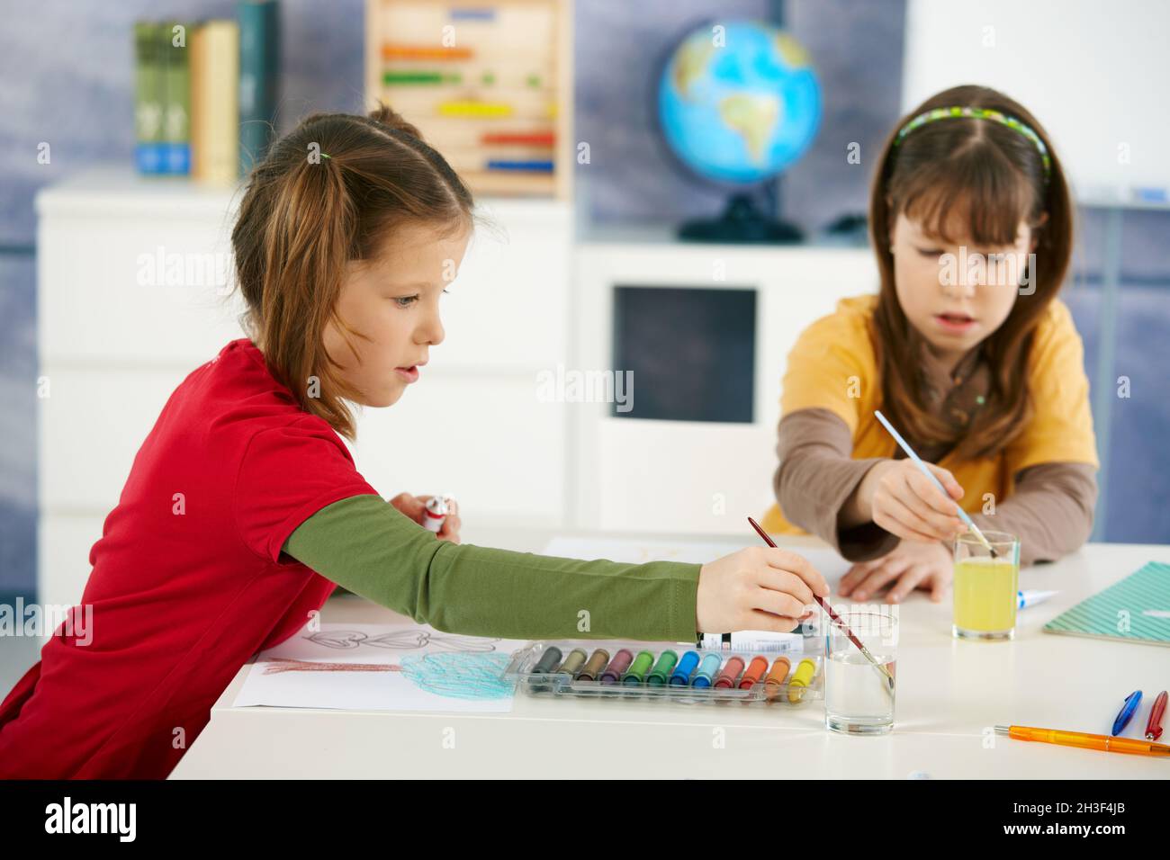 Children painting in art class at elementary school Stock Photo - Alamy