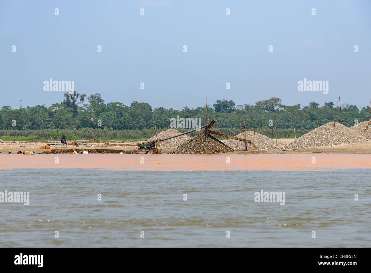 Heavily poluted river water from gold mining operations along Rio Madre de Dios in the Peruvian Amazon. Madre de Dios, Peru. Stock Photo