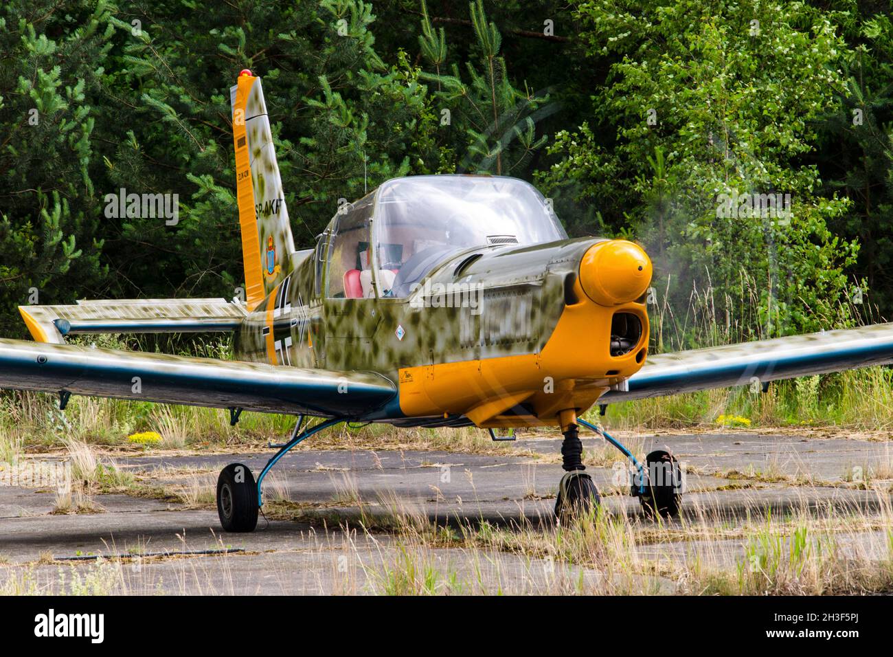 Biala Podlaska, Poland - June 22, 2014: Polish Aviation Legends (Fundacja Legendy Lotnictwa) open day - Zlin 42 (SP-AKF) Stock Photo
