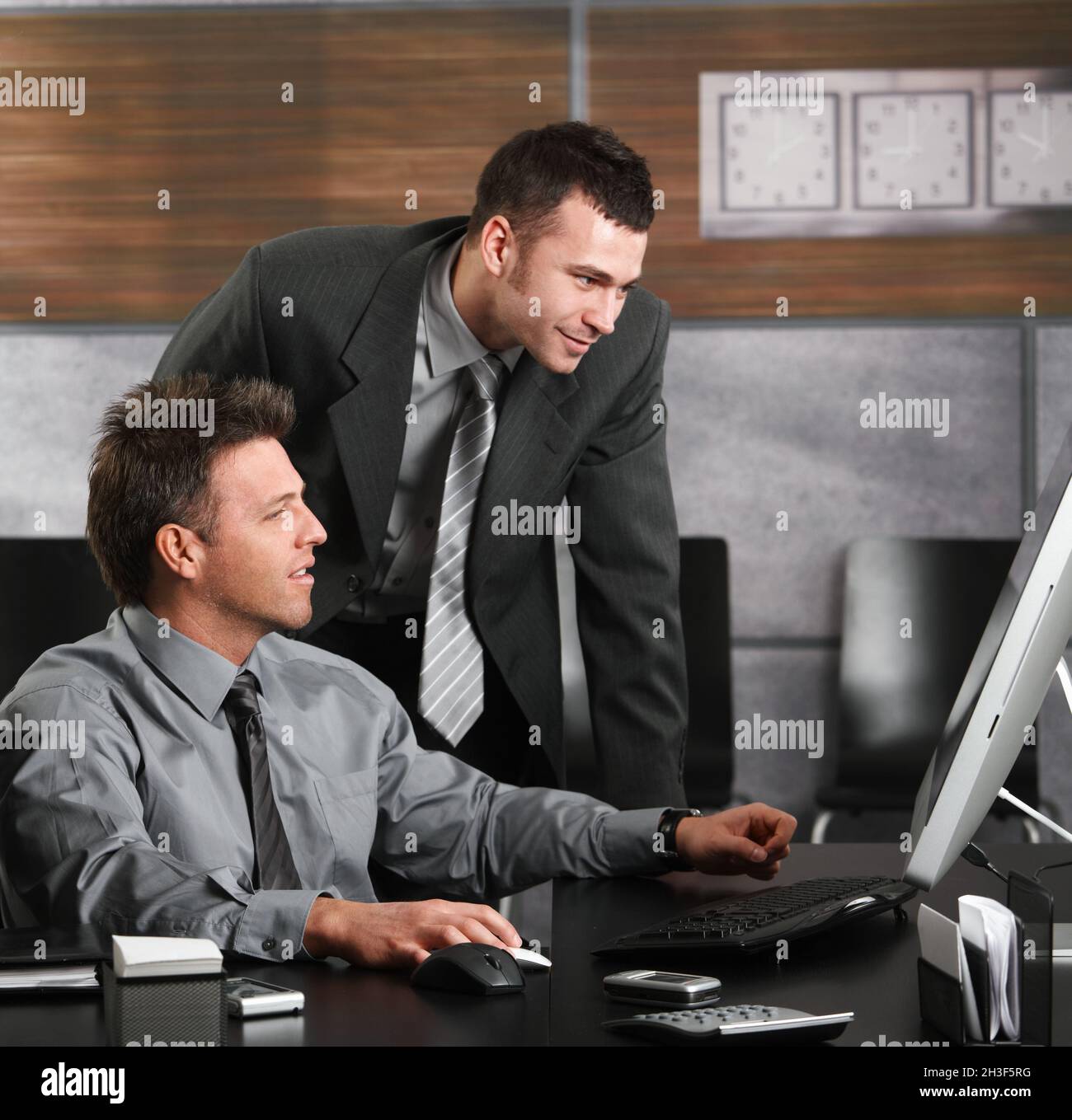 Businessmen working with computer Stock Photo