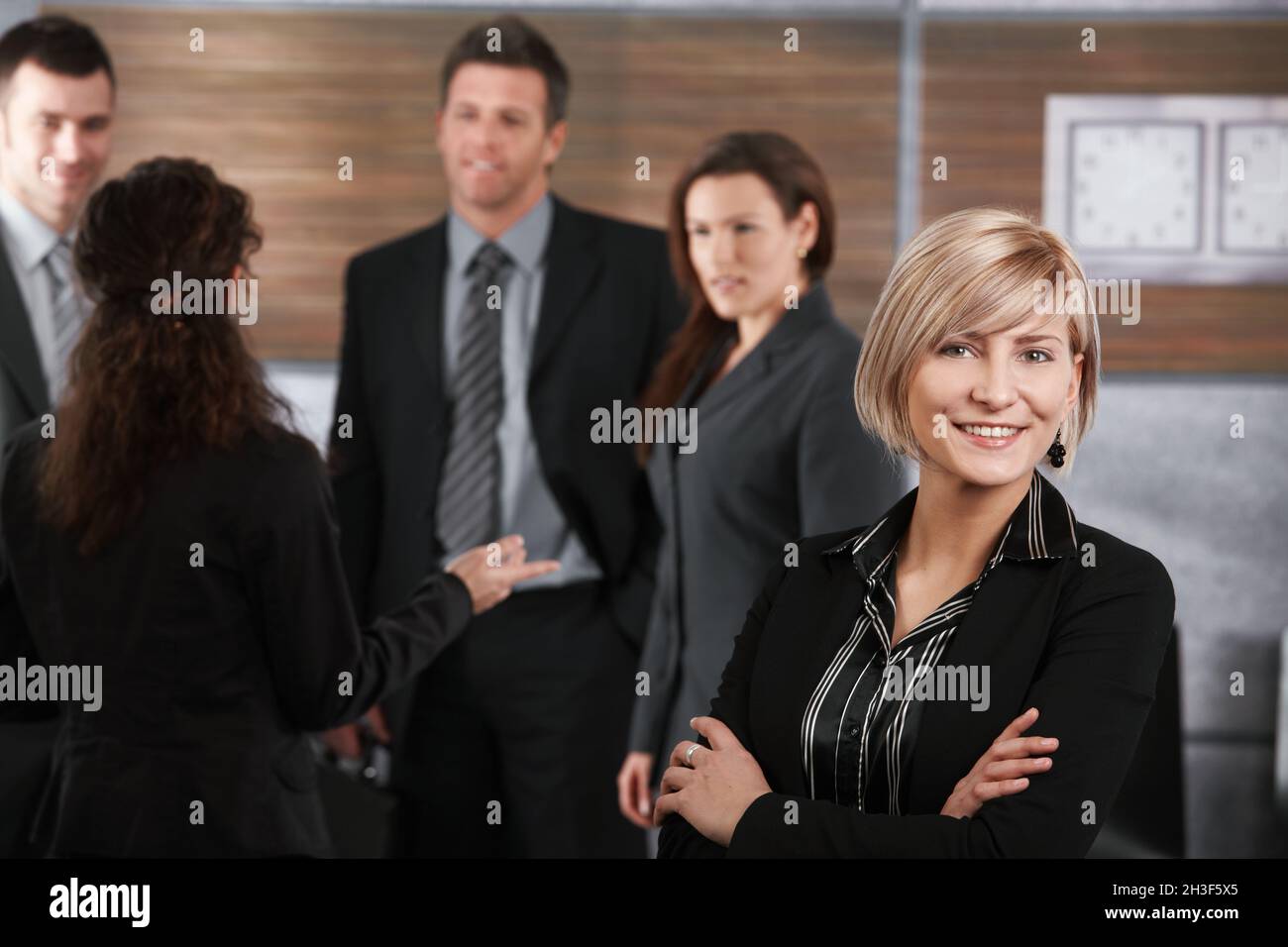 Young female employee wearing hi-res stock photography and images - Alamy