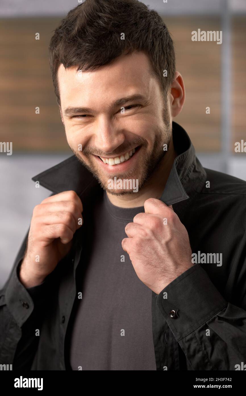 Young man smiling confidently in hi-res stock photography and images ...